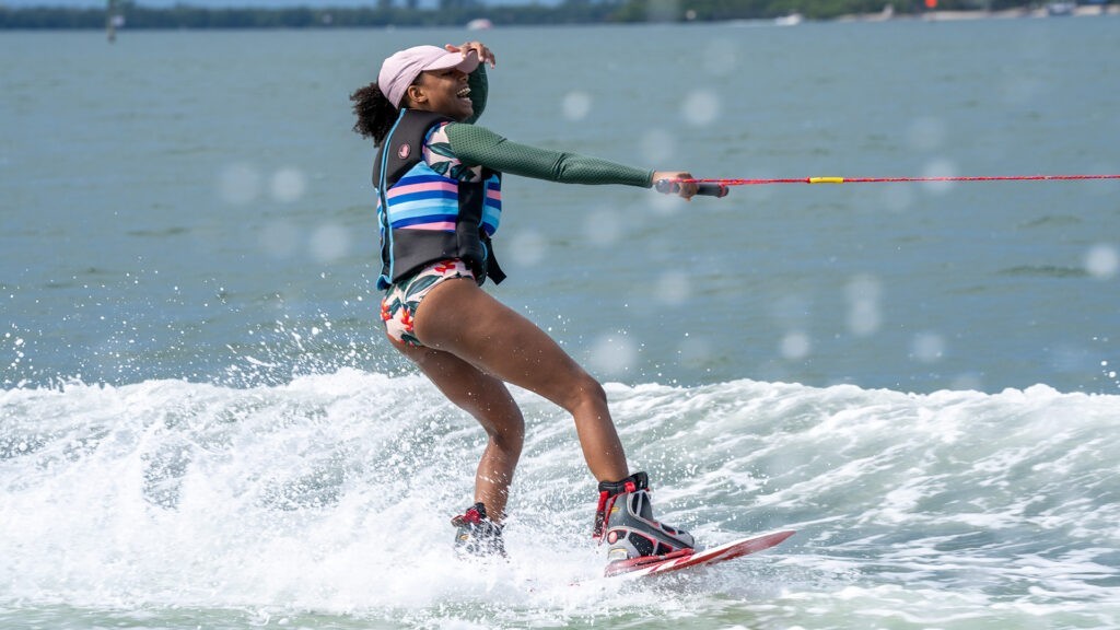 Wake boarding behind NauticStar 243 DC Deck Boat