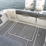 Retractable three person transom seating - up