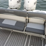 Retractable transom seating - down