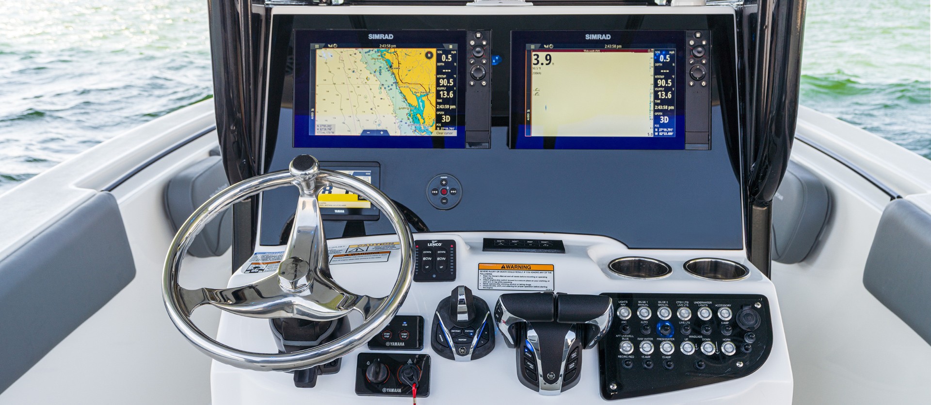 The helm command center features a blackout helm dash, optional dual screens, joystick maneuverability, and marine-grade switch system.