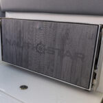 Folding seat with branded marine mat surface (stowed)