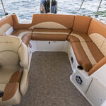 Spacious aft U lounge with plush chaise lounge and full backrests
