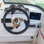 Ergonomically-designed fiberglass console with gauges, stereo, Simrad NSX7 (7” screen), and more